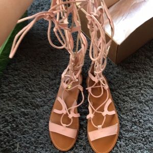 Pink lace up gladiator sandals